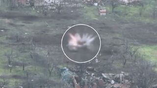 Ukrainian soldiers in the Bakhmut area using a DJI Mavic 3 UAV to walk MK-19 grenade launcher fire onto targets
