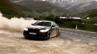 Black BMW M Showing Drift Skills