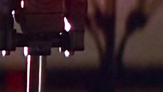 Hollywood movie. A women escape a antique statue in a unique way