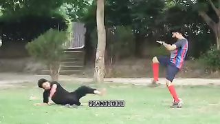 Fake football prank on strangers