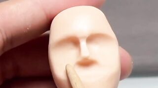 Venom head clay sculpture