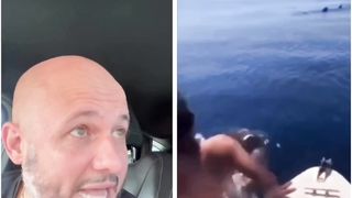 Man stand on shark back omg????????
