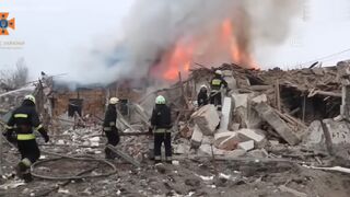 Ukrainian firefighters extinguish fire after Russian strike in Dnipro