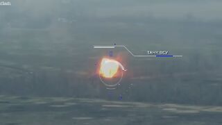 Ukrainian tank EXPLODES in ball of flame as it's struck by Pro-Russian artillery