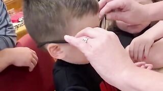 Little boy sees his parents’ faces clearly for the first time