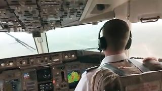 Pilot lands in turbulent weather with low visibility and rain