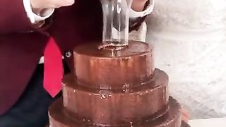 Wedding Cake becomes amazing when they lift the cup!