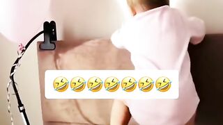 Funny baby playing with daddy