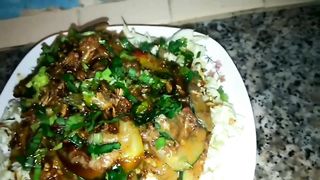 lontong dish mixed with peanut sauce