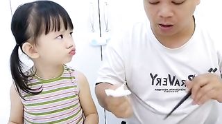 Intelligent and funny baby with family
