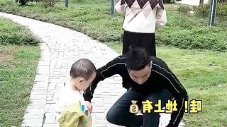 Lovely baby with his parents