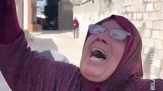 Mère palestinienne en pleure