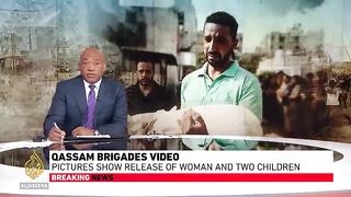 Hamas video appears to show release of woman, two children