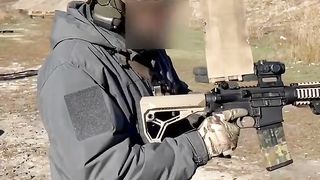 Russian Soldier Poses with Trophy M4A1 | RCF