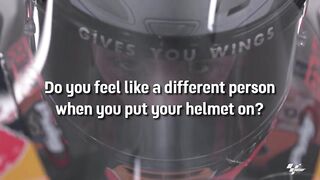 Do MotoGP riders take turns when wearing helmets?
