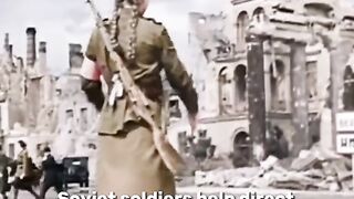 Soviet soldiers help direct traffic in Berlin