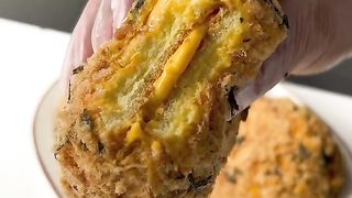 Pumpkin filling cake pie covered with pork floss & shredded nori.