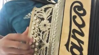 Great concertina player playing very well.