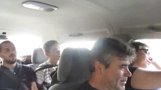 Very lively bus ride with a lively crowd.