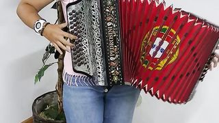 A girl playing a beautiful Vira.