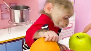 cute monkey eating fruit 2
