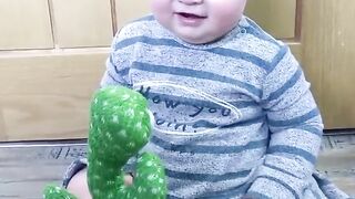 Cute Babies Playing with Dancing Cactus(Hilarious) #shorts #shortvideo #funnybaby.