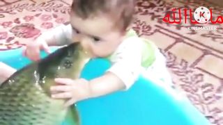 Cute kids playing with pet fish