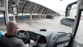 Bus drive in the Alps, snow season,  4K