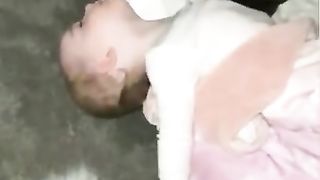 This baby has a funny sleeping position