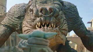 Baby Yoda takes on the Rancor