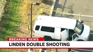 Man and woman found dead inside van in parking lot