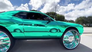 Chrome Teal Challenger on 34's ridin