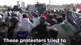Turkish protesters try to storm airbase housing US troops