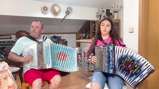 The student plus the teacher playing the Arcos anthem.