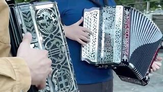 Three generations playing concertina for the Gomes family.