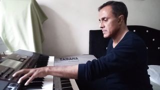 Playing the song "Flowers don't work without flowers" by Amir Hossein Alborz