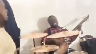 Playing drums