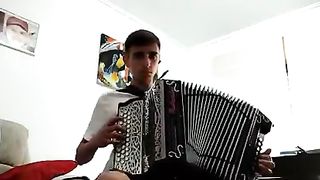 Rafael showing his talents on the concertina