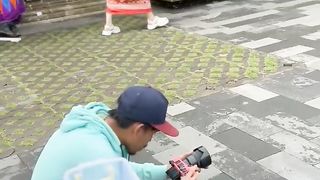 Behind take picture with guest Filipina