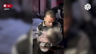 Touching scene of a Palestinian speaking to his daughter, who was martyred as a result of the raids on Gaza****