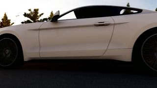 mixkit-white-sports-cars-traveling-in-a-highway-35231-medium.