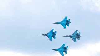 combat-airplanes-do-acrobatics-in-the-sky-7022-medium.