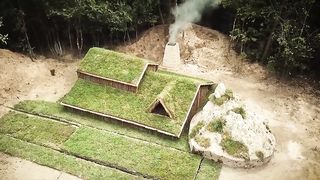 Building underground hut with grass roof & fireplace with clay. 2