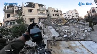 Heavy fighting in Gaza Strip, Israeli soldiers fire on Hamas positions inside buildings