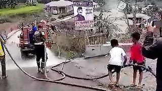 road cleaning due to volcanic ash from Mount Marapi
