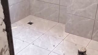 washroom tile floor slope