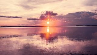 "Golden Hour Glory: Witnessing the Magic of a Radiant Sunset"