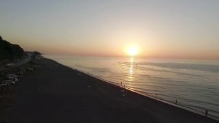 "Horizon Harmony: A Cinematic Exploration of the Setting Sun"