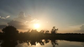"Embers of the Sky: A Captivating Tale of the Setting Sun"