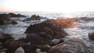 "Sunset Reverence: Nature's Majestic Exit in Technicolor"